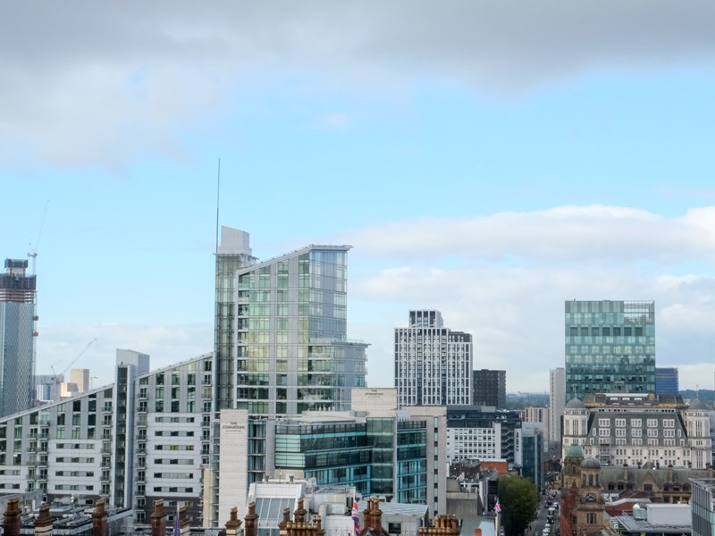 A wide shot of high rise buildings in Manchester.
